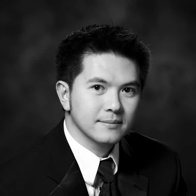 A headshot of Dr. Thi Nguyen, a dentist at Aden Dental.